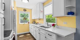 Charming Wheaton Cottage w/ Solar Panels, Finished Basement & 2-Car Garage Gallery 3