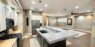 Open Kitchen, Expansive Living, and Covered Patio in Tranquil South Reno Near Trails, Parks & Shopping Gallery 5