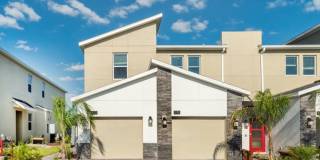 BEAUTIFUL CHAMPIONS GATE 2 BED 2 BATH COND0 w/GARAGE - FULLY FURNISHED - 12 MONTH RENTAL Gallery 1