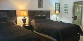 Welcome to this fully furnished vacation or corporate  3 bedroom 2 baths with solar heated pool home Gallery 24