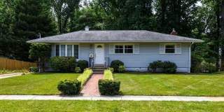 Tucked away in a serene setting surrounded by mature trees and a peaceful stream, this beautifully appointed residence offers both privacy and convenience with easy access to Route 66. Gallery 1