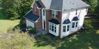 Gorgeous Fluvanna Home located in Sycamore Square, just outside the Gate near Lake Monticello with new paint & Laminate floors! Garage, Basement & half acre lot! Gallery 1