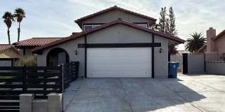 Fully Furnished 4 Bedroom Home! NO HOA! Park up to 6 vehicles! Pool and Spa! Close to Spring Mountain. Short Term Rental OK. Gallery 1