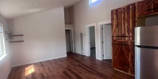 2 Bedroom 1 bath house with extra large double car garage and extra storage space! Gallery 6