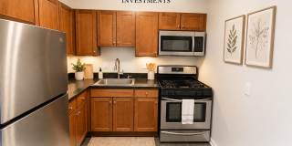 2026 Move-In Special – $500 LEASE SIGNING BONUS!! Spacious 2BR Condo Near Naylor Rd Metro – Washer/Dryer + Reserved Parking!! Gallery 1