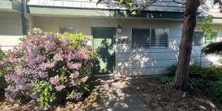 NW Vancouver Condo with Detached Garage & Dedicated Parking Gallery 1