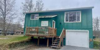 4 bedroom single family home in Palmer!  New kitchen and fresh paint throughout. Available July 1! Gallery 1