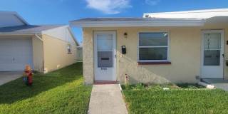 Adorable 1 Bed/1 Bath Villa in the 55+ New Port Colony Community Gallery 1