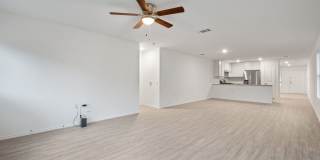 This beautiful single-story home has 4 bedrooms, 2 baths, vinyl flooring throughout, an open floor plan Gallery 13