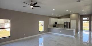 Brand-New Luxury Home with 3-Car Garage & Lawn Care Included | Modern Living in Cape Coral! Gallery 5
