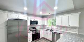 Beautifully Renovated Home on Corner Lot with Finished Walk-Out Basement Gallery 1