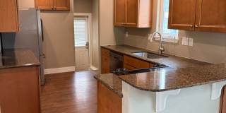 Spacious 2 bed/1 bath home! Fenced yard, a/c, d/w, w/d, large garage and MORE!! Gallery 14