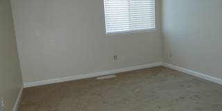 Townhouse Located Near School, Parks, Freeway Access! Gallery 13