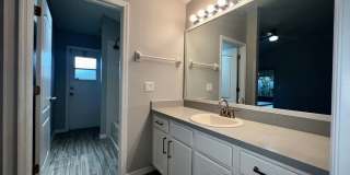 RESERVE AT WEDGEFIELD 3 bedroom 2 bath home with stainless appliances, laminate flooring and a fenced back  yard! Gallery 22