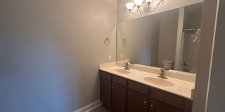 Don't miss this 4-bed, 3-bath condo TWO miles from the ocean! Gallery 29