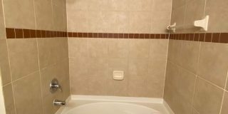 Spacious 2BR/2BA First-Floor Condo with Garage Gallery 22