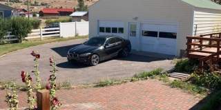 House in Big Arm with a shared double car garage Gallery 1