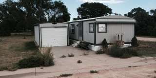 Cozy 2 Bed 1 Bath - 1 Car Detached Garage Gallery 1