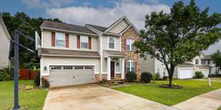 Spacious Five-Bedroom Residence with Expansive Fenced Yard and Screened Outdoor Living in Lexington Gallery 1