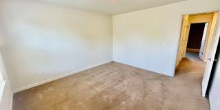 Cedar Hills/Mills Area Two Bedroom Townhome with 2 Car Garage, A/C & Private Deck. Gallery 21