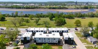 Discover modern elegance in the newly constructed Edgewater Condominiums, a boutique community featuring 18 luxurious units with 9 still available for purchase. Gallery 30