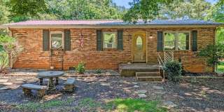 Charming 3BR Home with Covered Parking & Fenced Yard Gallery 1