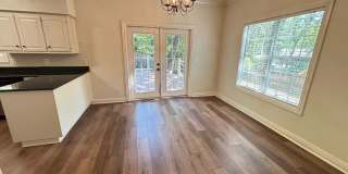Beautiful 4BR Home with New LVP Flooring & Lawn Care Included Near The U of A! Gallery 8