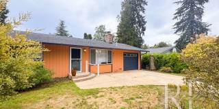 Single-Story Home with Fireplace, Garage, Fenced Backyard & Lawn Sprinkler System Gallery 1