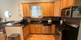 Beautifully updated & maintained 2 bed/2 bath Noble Square condo in an intimate 3 unit building. Gallery 7
