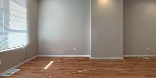 Charming 4BR/2BA Rowhouse with Hardwood-Style Flooring Throughout Gallery 11