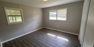 3br 2ba brick home with carport and fenced in yard. Gallery 7