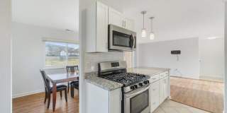 2Br/ 1Ba - Beautifully renovated first-floor walkout condo in water privileged community available now! Gallery 15