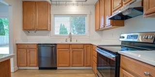 Lovely Ranch style home with park like rear fenced yard, Commonwealth lake Park just around the corner. Gallery 11