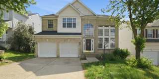 Stunning 4-Bedroom + 2 Den Home in Sought-After Walney Village Gallery 1