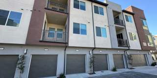 Brand New 1 bedroom, 1 bath Townhome with 2 car tandem garage for lease Gallery 1