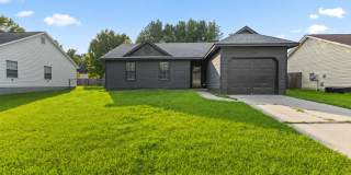 Stylish Home with Open Floorplan & Fenced Backyard Gallery 1