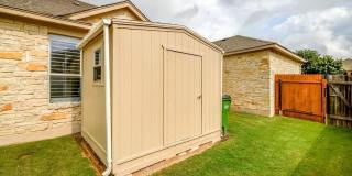Beautiful one story stone home in Estates at Settlers Park Gallery 22