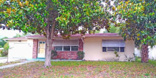Spacious 2/2 home featuring neutral ceramic tile throughout within the heart of Spring Hill Gallery 1