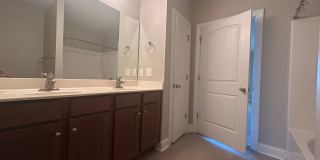 Don't miss this 4-bed, 3-bath condo TWO miles from the ocean! Gallery 28