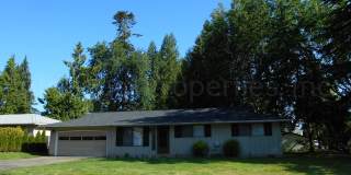 Beautiful Ranch Style Home on Very Large Corner Lot With W/D Hookups, Fireplace, 2 Car Garage & A/C Unit! Gallery 1