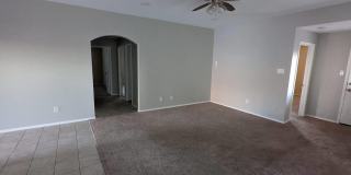 2 car garage with lighting, granite countertops. Backyard includes a custom extended concrete patio perfect for gatherings Gallery 14