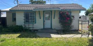 Charming 2-Bedroom Home with Spacious Yard Gallery 1