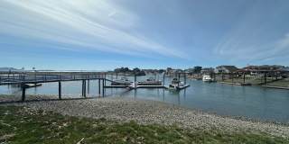 RENT SPECIAL! 1/2 MONTH OFF RENT IF SIGNED LEASE BY 9/30! 2 Bed 2 Bath Waterfront Condo in Sandy Point Gallery 1