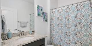 Like new gorgeous ground level Condo with Detached Garage and open floor plan. Gallery 10