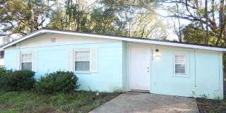 Renovated 3/1 House w/ Tile Floors Throughout, New Kitchen, New Paint, Huge Fenced Yard, Washer/Dryer,  Den! Avail NOW for $1395/month! Gallery 1