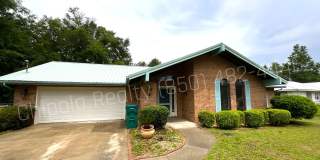 Fantastic 3/2 Home in Sunny Hills w/ 2-Car Garage & Lawn Maintenance Gallery 1