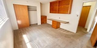 Charming 2BR Apartment with Balcony & Covered Parking – Live Near It All! Gallery 12