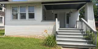 Spacious Akron Single-Family Home with Front Porch, Dining Room, Fireplace & Backyard! Spacious Akron Single-Family Home with Front Porch, Dining Room, Fireplace & Backyard! Gallery 1