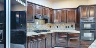 Experience luxury living in the prestigious Gainey Village! Gallery 8