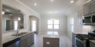 Come check out this Riverwood home in Lowell! Gallery 4